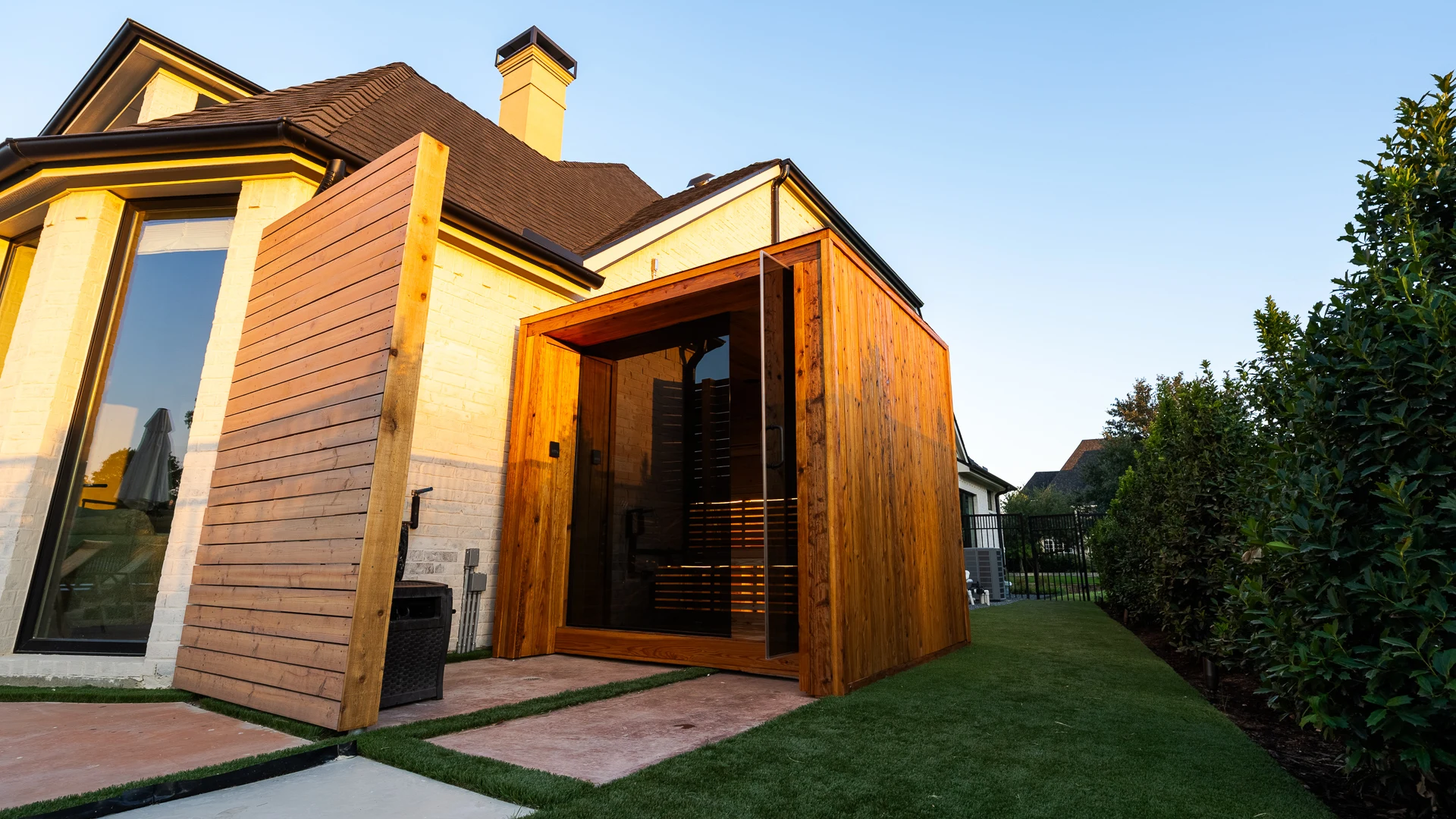 Under-bench LED lighting glowing through cedar bench slats